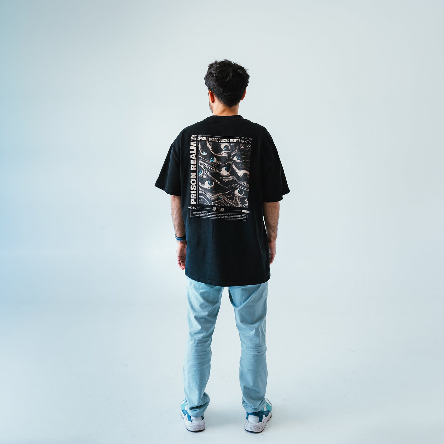 Prison Realm Black T-shirt, back full body view